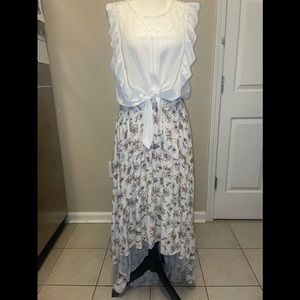 NWOT 2 pc Feminine, flirt & fun 2 piece lace shirt & high low floral skirt